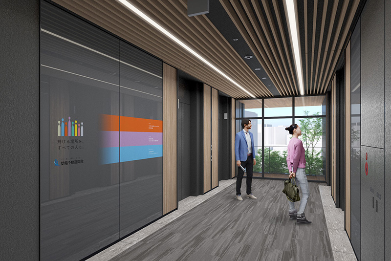 写真：入壁面利用が可能なエレベーターホール