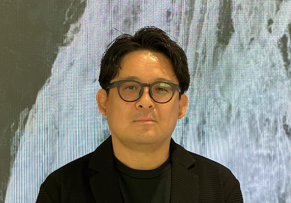 写真：開発事業本部 第二事業部 運用グループ チーフリーダー 井口 良